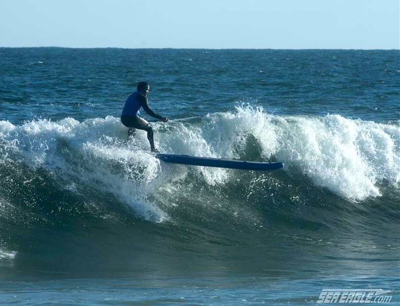 Sea Eagle Longboard surfing the waves