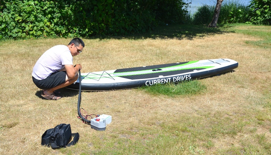 using the electric pump with battery pack to inflate the SUP