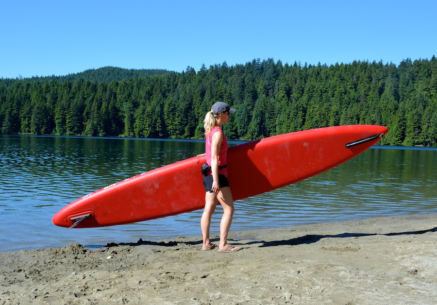 carrying the 14' Elite Race paddle board