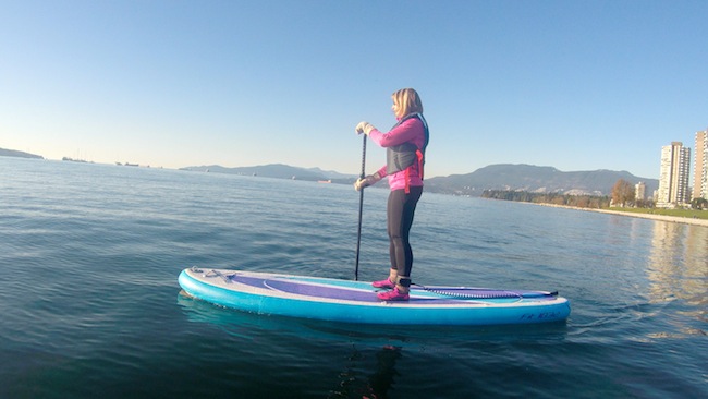 paddling the Airhead Fit inflatable SUP in Vancouver off Kits Beach