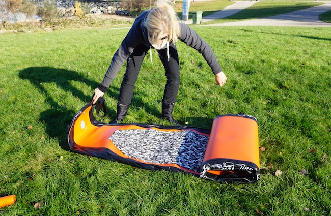 unrolling 12'6" inflatable SUP