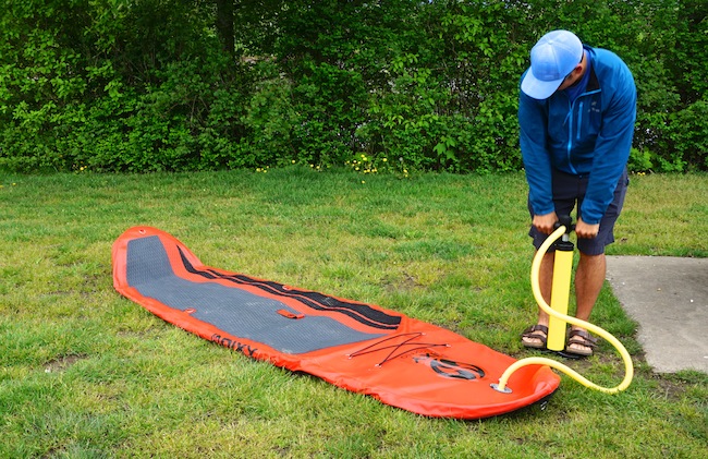 inflating paddle board