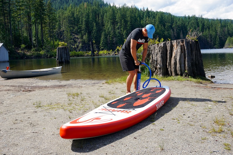 inflating Shark paddleboard