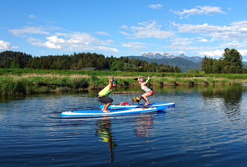 squats on paddle board SUP fitness