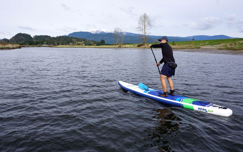 paddling the 12'6" Hero SUP Dynamo on mountain lake