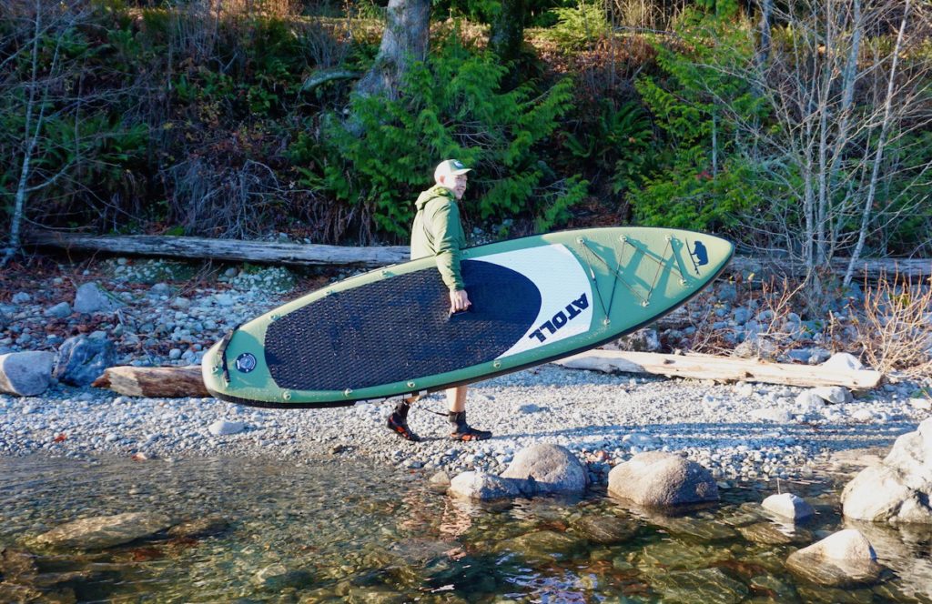 carrying the green atoll board with center carry handle
