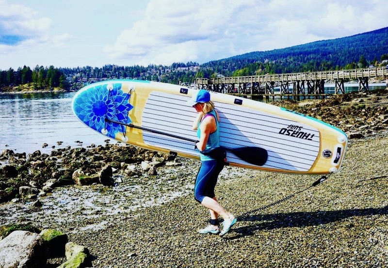 carrying the thurso surf tranquility paddle board