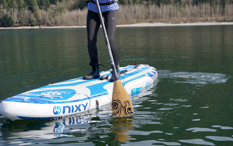 Paddleboarding with the Nixy bamboo carbon fiber paddle