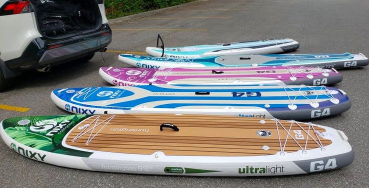 inflating the Nixy paddle boards with Ventus electric pump