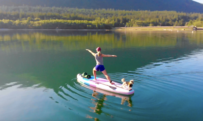 practicing SUP yoga on the Chasing Blue Synergy inflatable paddle board