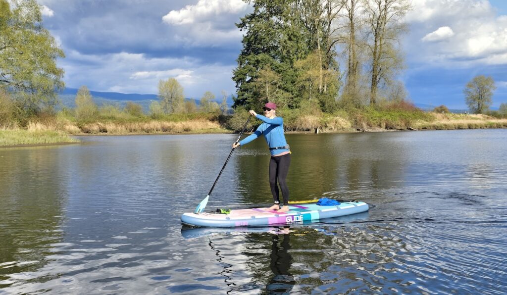 paddle boarding on the Glide Retro inflatable SUP