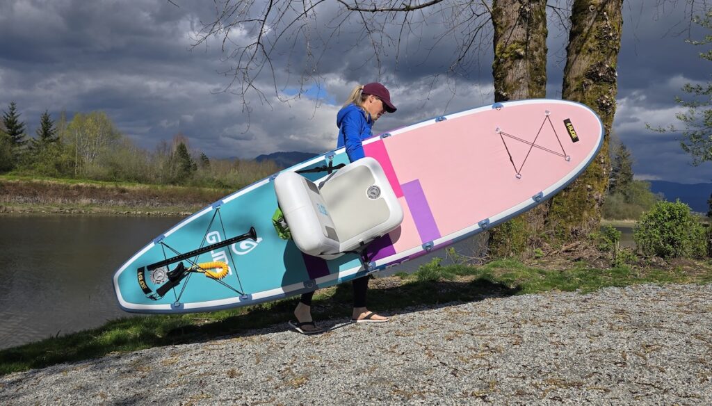Carrying the Glide Retro Elite inflatable stand up paddle board hybrid kayak