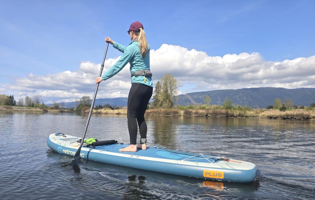 paddling the Weekender Plus Retrospec all around paddle board